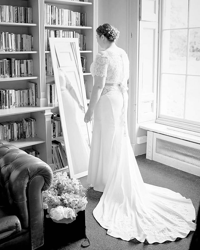 Sometimes you can't choose where your bride is going to be getting ready and in this case, my bride was getting ready in this library room. Although I loved the wall lined with shelves upon shelves of books, all the colours in the room clashed with e