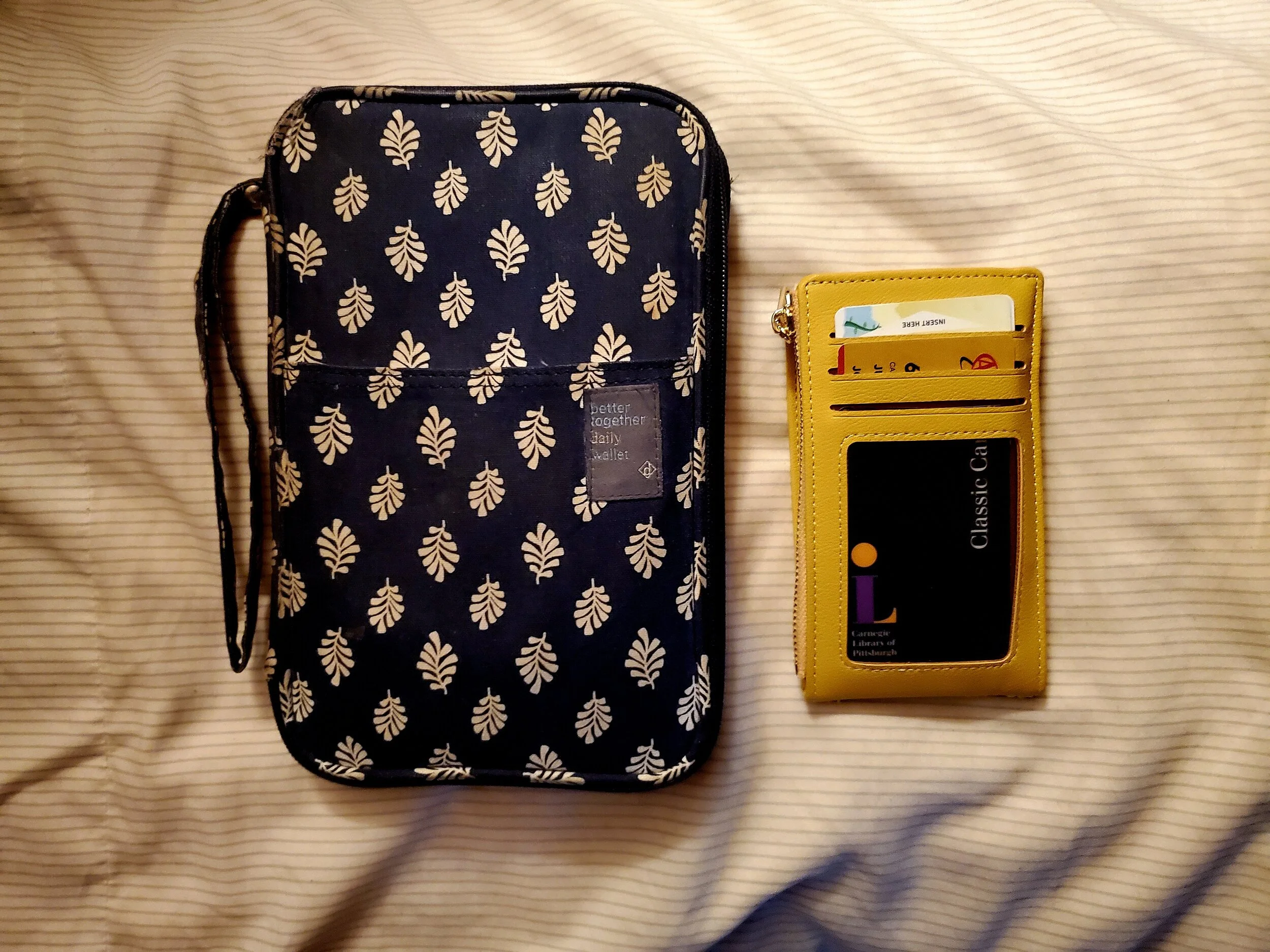 Check the size difference from my old wallet (big boi) to the one!