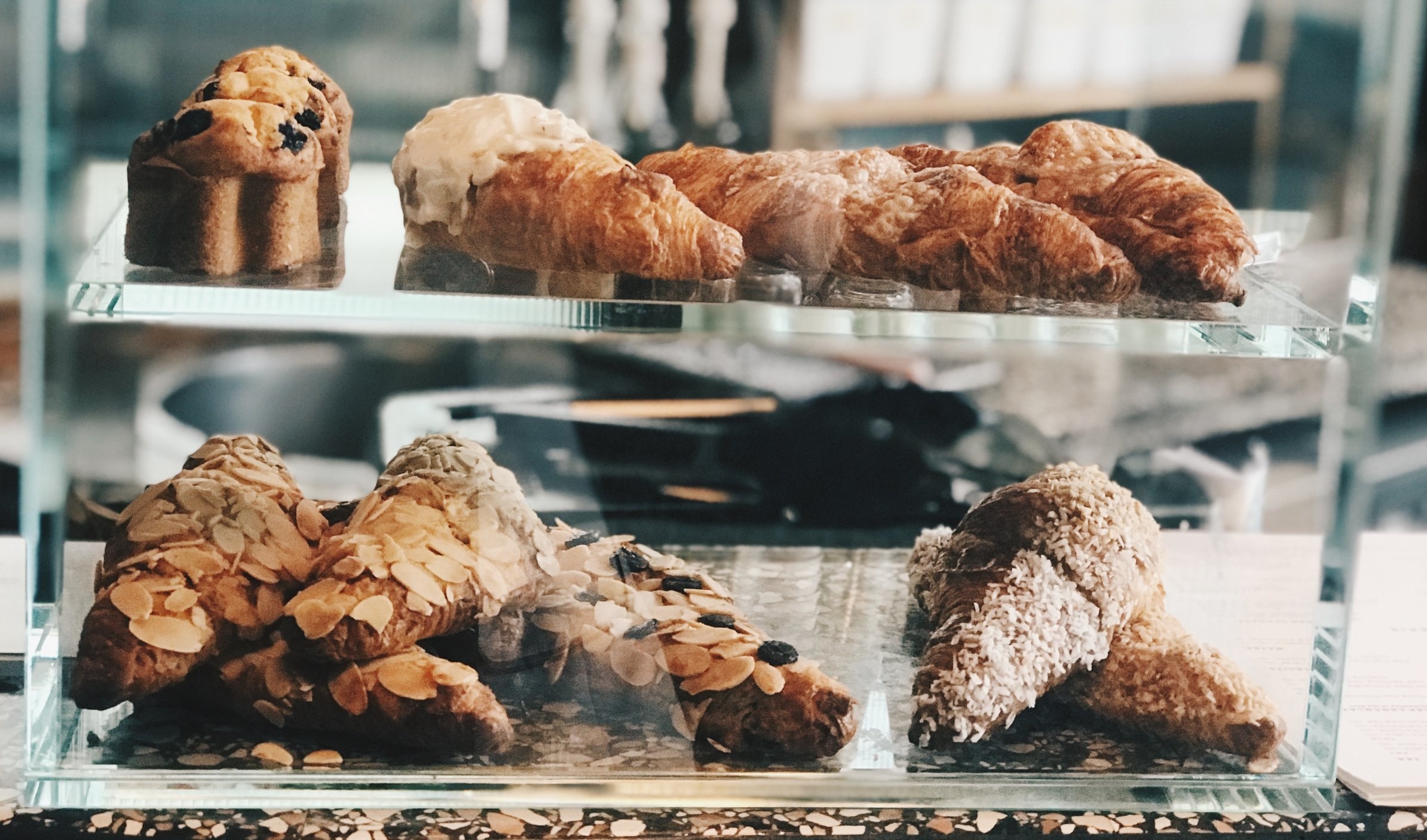 Muffins, scones + croissants are all great options. Plus, chances are that they’re fresher, easier to chew (higher moisture content) and have better ingredients than any energy bar that has been sitting on a shelf for weeks.