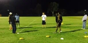 Michael Farmer teaches students the practical component of the Level One AFL Coaching Accreditation.jpg