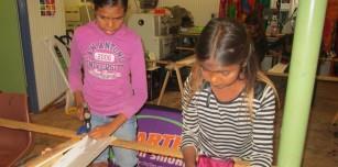Balgo students try their hand at Silk Screening during Deadly Divas Day.