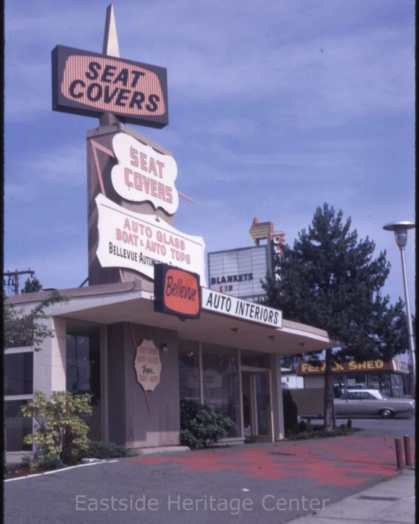 Bellevue Auto Interiors. Bellevue Way &amp; NE 4th, 1969. (1998.25.24)

 #kingcounty #localhistory #bellevue #shopping #automotive