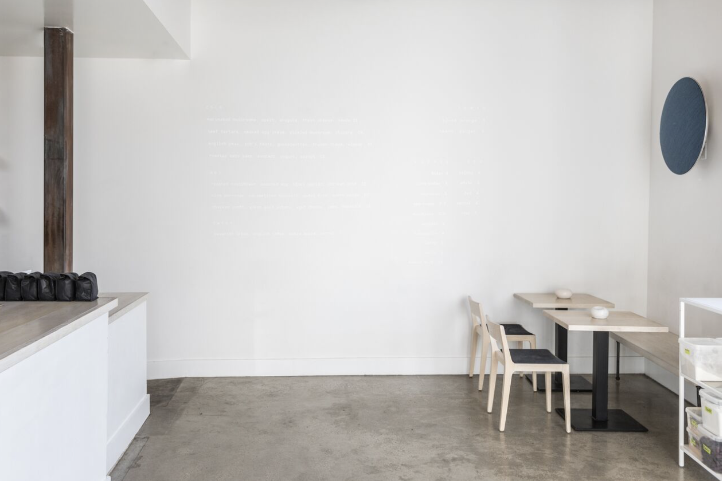The walls are painted in Behr’s Ultra Pure White .