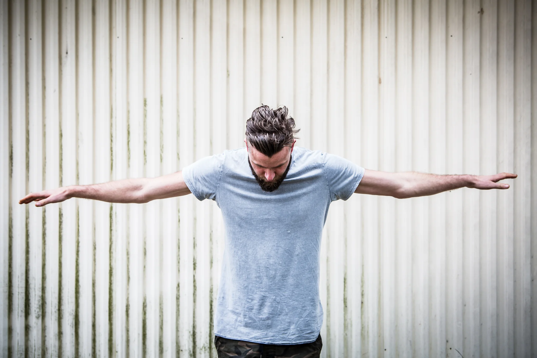 male-arms-spread-portrait.jpg