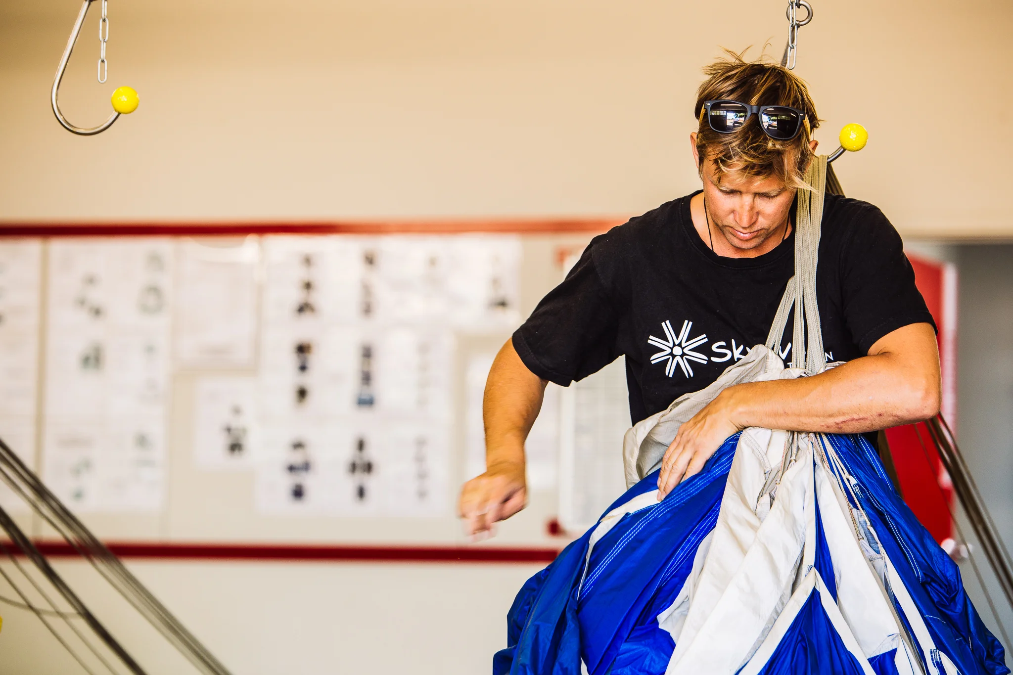 man-packing-skydive-parachute.jpg