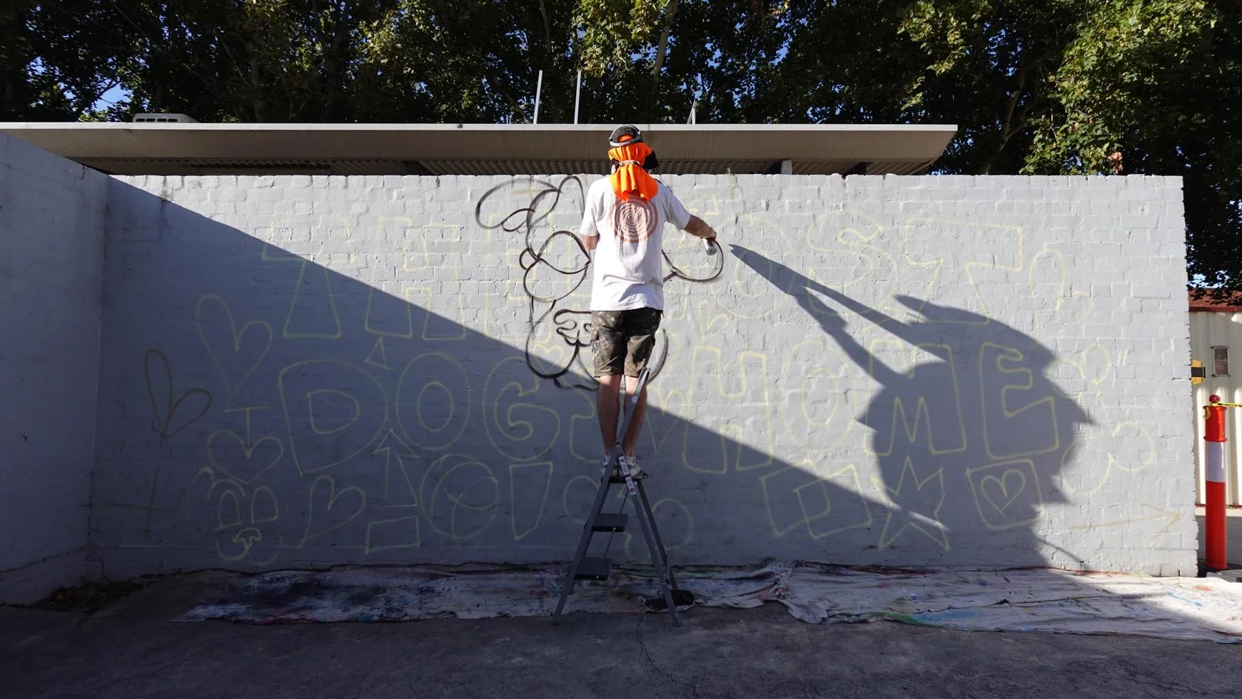 Mural painted at The Lost Dogs Home at 2 Gracie St, North Melbourne VIC 3051 by Melbourne Mural Artist Lukas Kasper