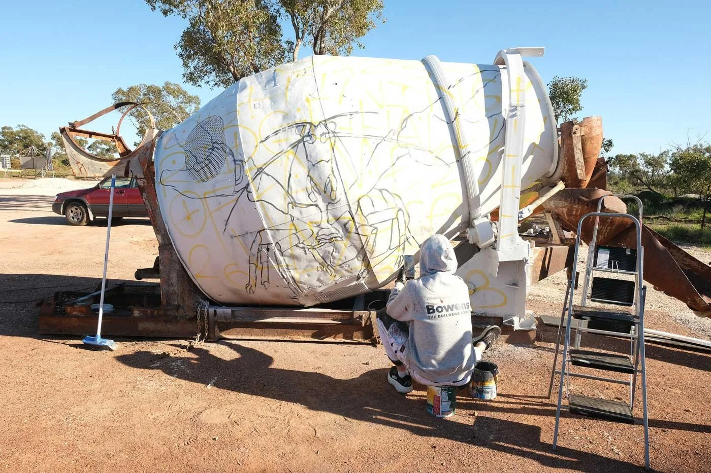 Art Agitators Mural project painted in Lightning Ridge On The Opal Miners Hall Of Fame facilitated by The John Murray Art Gallery found on the Yellow Car Door Tour