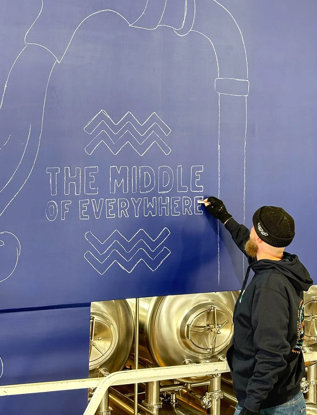 Brevet Brewing floor-to-ceiling brewery mural in Sale, Victoria, created by Melbourne mural artist Lukas Kasper in collaboration with The Middle of Everywhere, featuring aviation-inspired wings and abstract design.