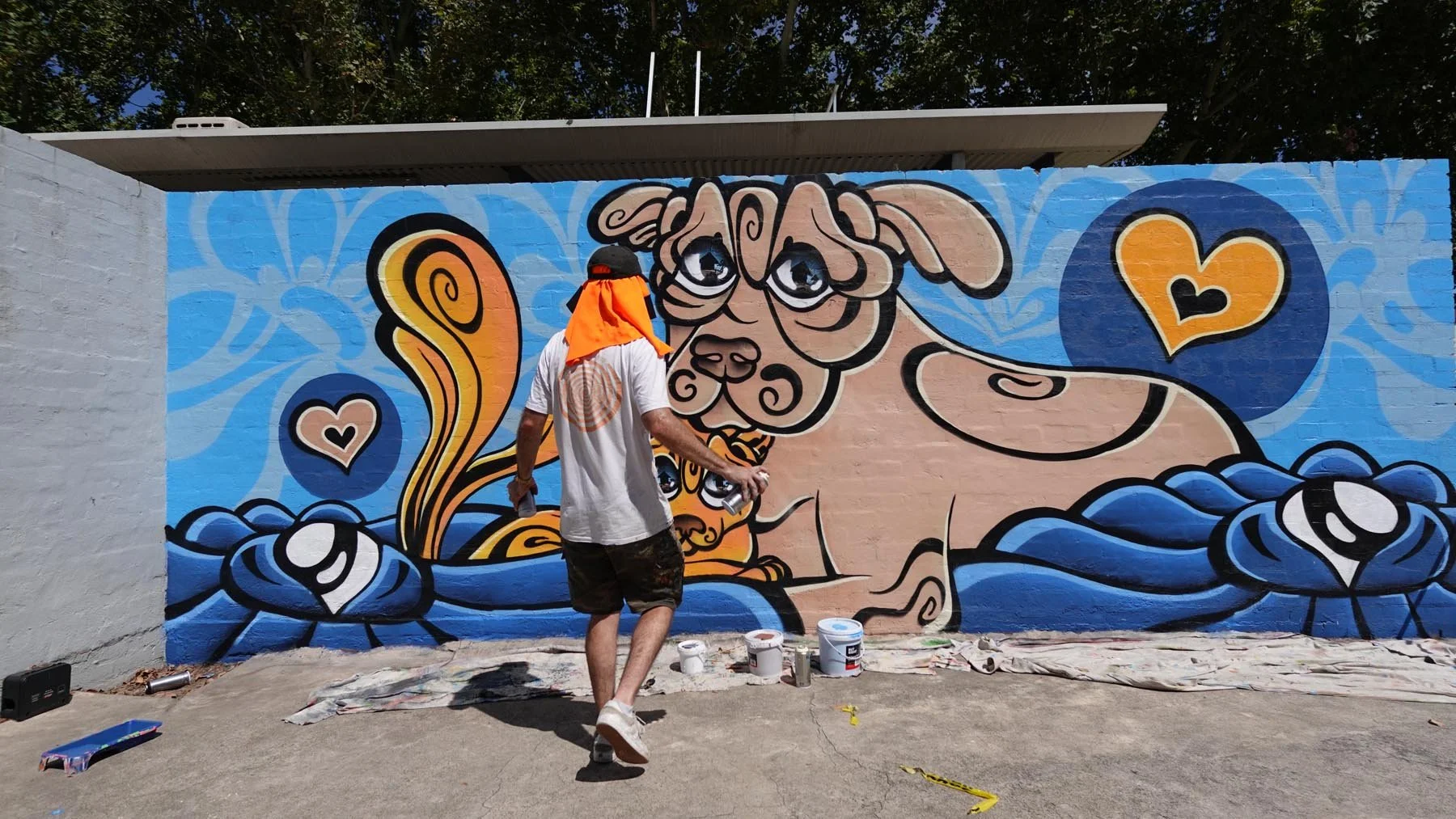 Mural painted at The Lost Dogs Home at 2 Gracie St, North Melbourne VIC 3051 by Melbourne Mural Artist Lukas Kasper