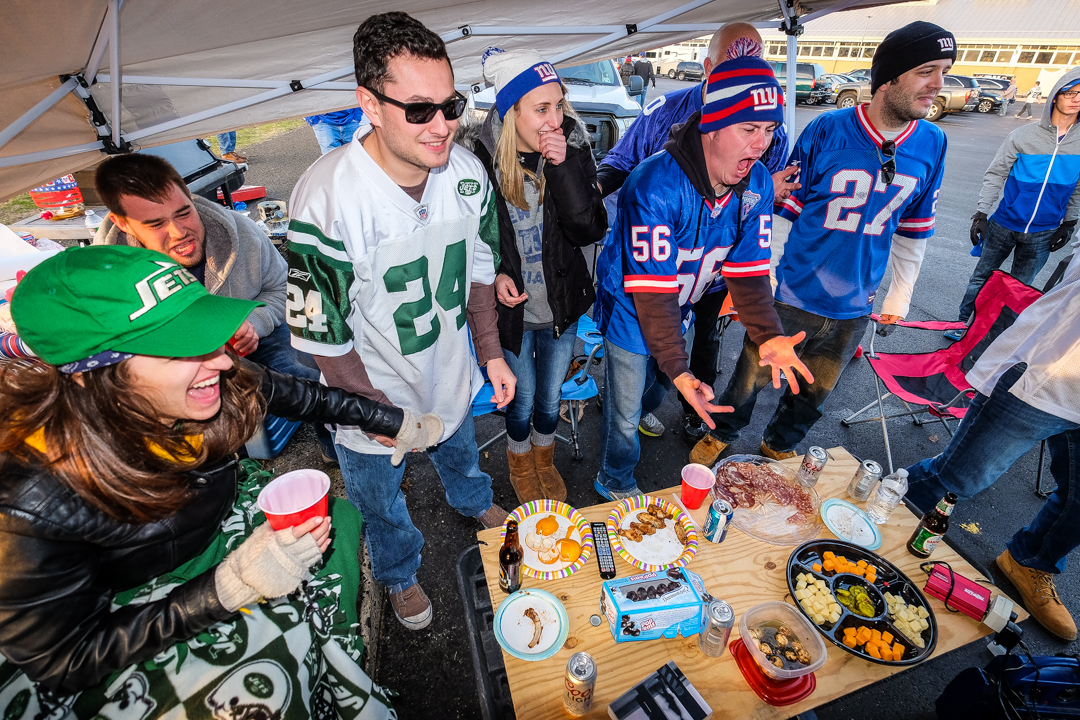  East Rutherford, NJ - Dec. 6, 2015: Jets and Giants fans tailgate in the parking lot of MetLife Stadium for  a rare regular season matchup between the two teams. 