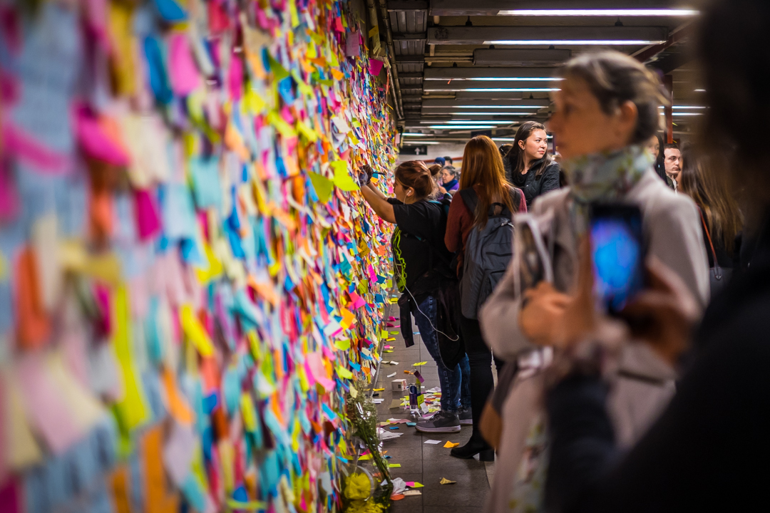  New York, NY - Nov. 16, 2016: Subway riders cover a wall in the Union Square subway station with post-its in response to the Presidential election of Donald Trump. 