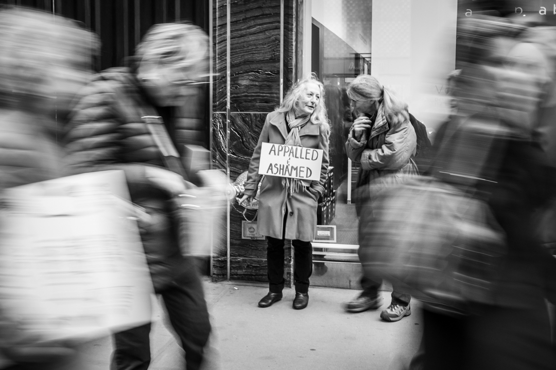  New York, NY - Jan. 21, 2017: Protesters march on 5th Ave take part in The Women’s March on NYC. The protest took place the day after the Presidential inauguration of Donald Trump and concluded at Trump Tower. 