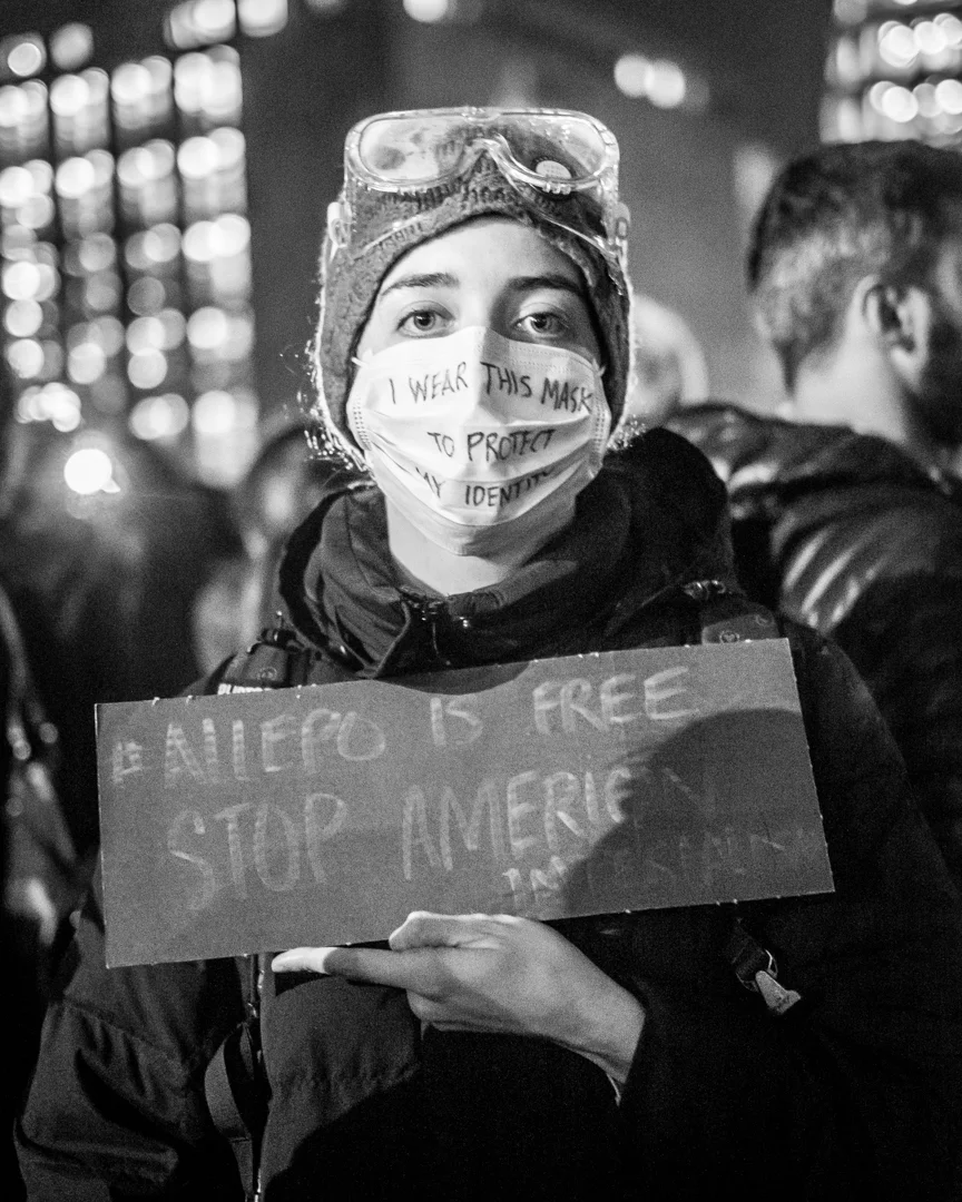 New York, NY - Jan. 25, 2017: A protester at the Emergency Rally for Muslim and Immigrant Rights, held at Washington Square Park the day after Donald Trump announced a plan to ban Muslim immigration into the U.S.
