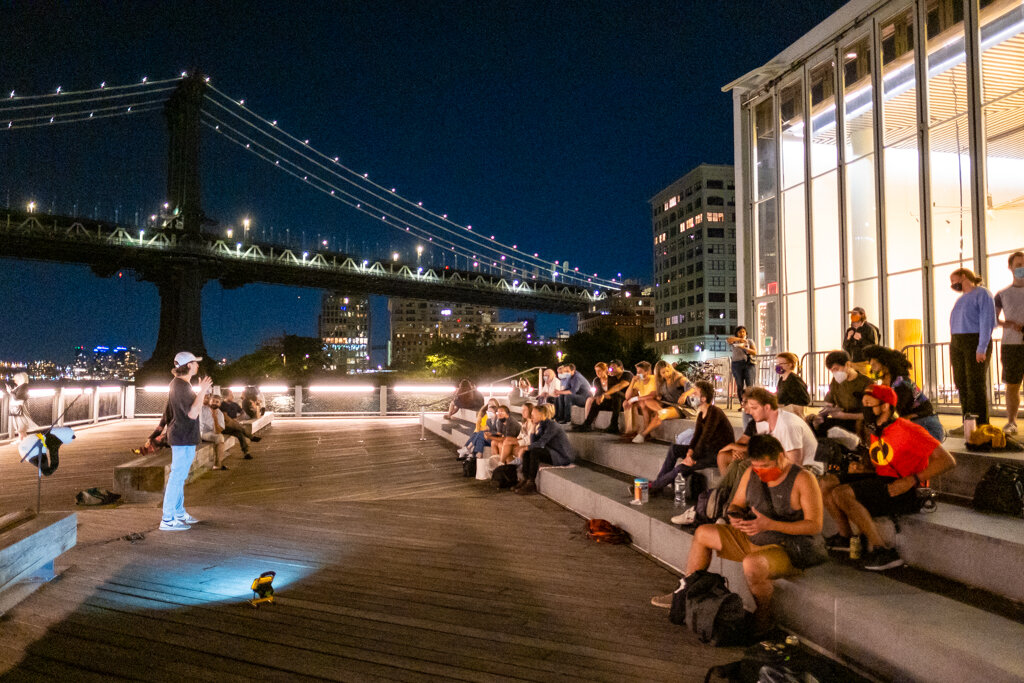  Aug. 30, 2020 - Brooklyn, NY:  Comedy fans gather for an outdoor stand-up show at Brooklyn Bridge Park.  Due to the COVID-19 pandemic many artists and performers have taken to outdoor performances to adapt to adversity. 