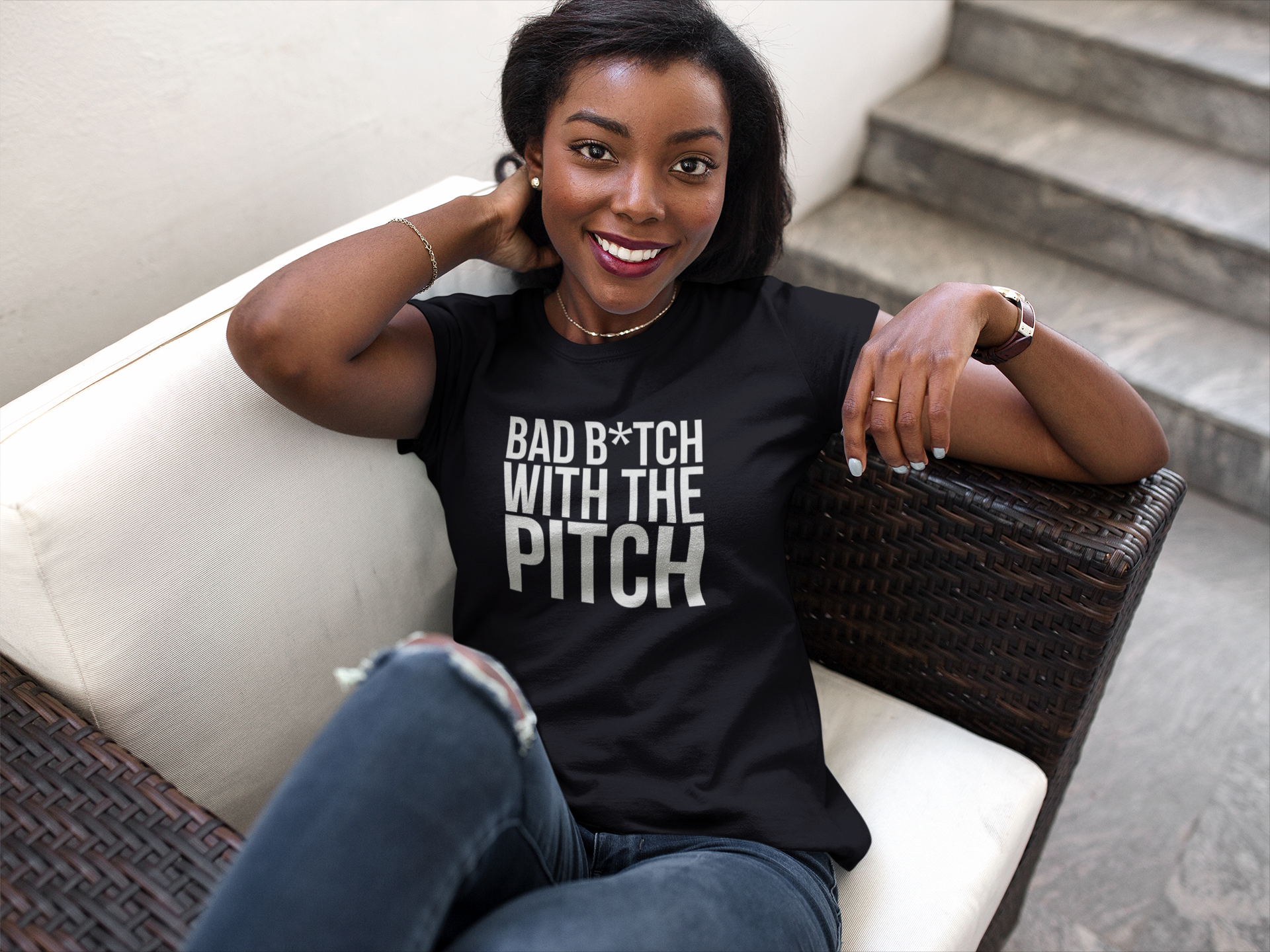 beautiful-young-girl-wearing-a-round-neck-tee-mockup-while-lying-on-a-sofa-a16059.png
