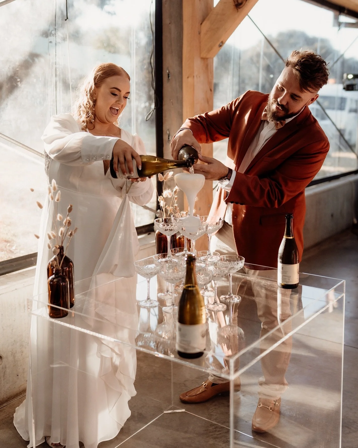 A champagne tower is THE perfect addition to your day 🥂
Georgia & Tyler 🤍
When you choose to add a champagne tower to your day, you get to choose between 5 different tier options. We supply our custom built champagne tower plinth, made by our