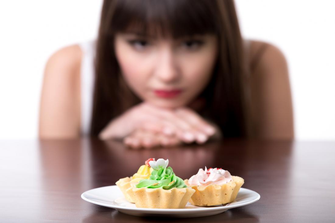 woman-looking-at-cake.jpg
