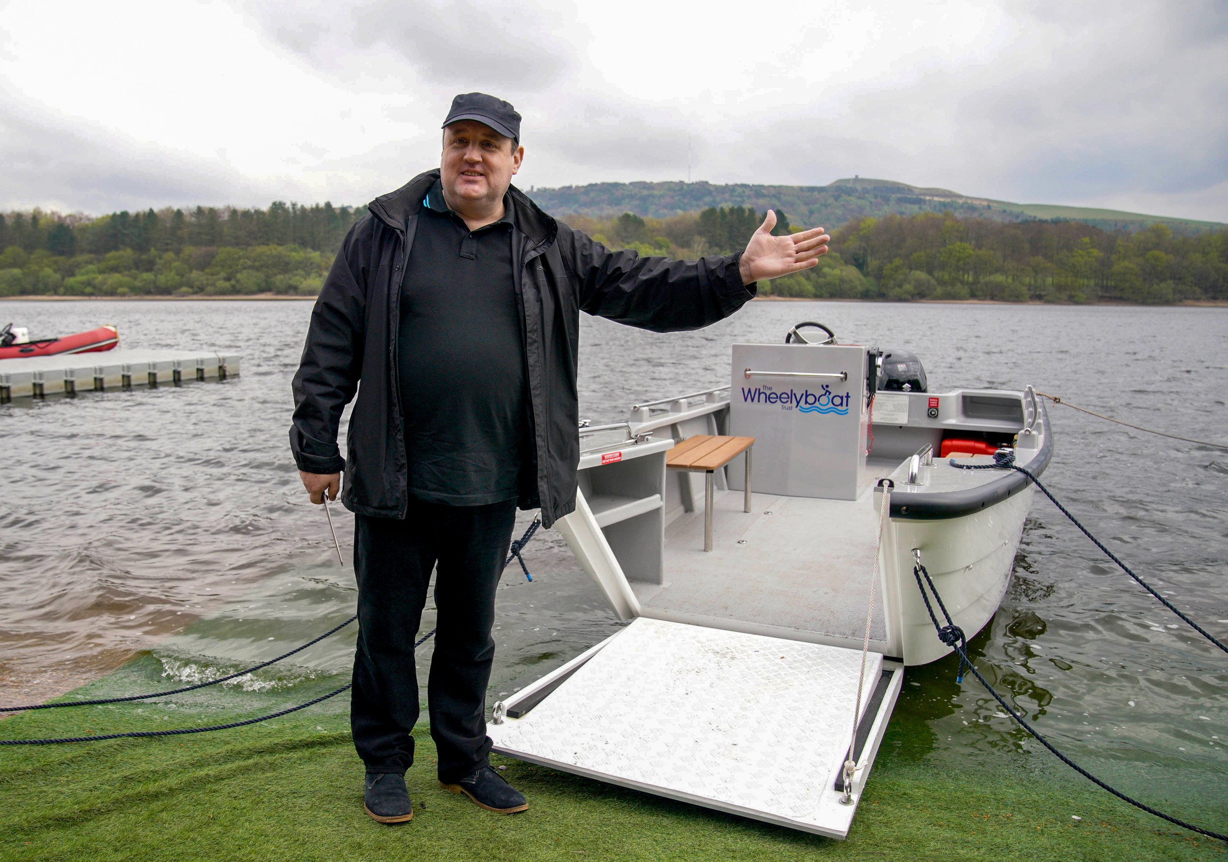 Peter Kay launching the Coulam V17 Wheelyboat at The Anderton Centre, Lancs (2). Credit Peter Byrne_PA.jpg