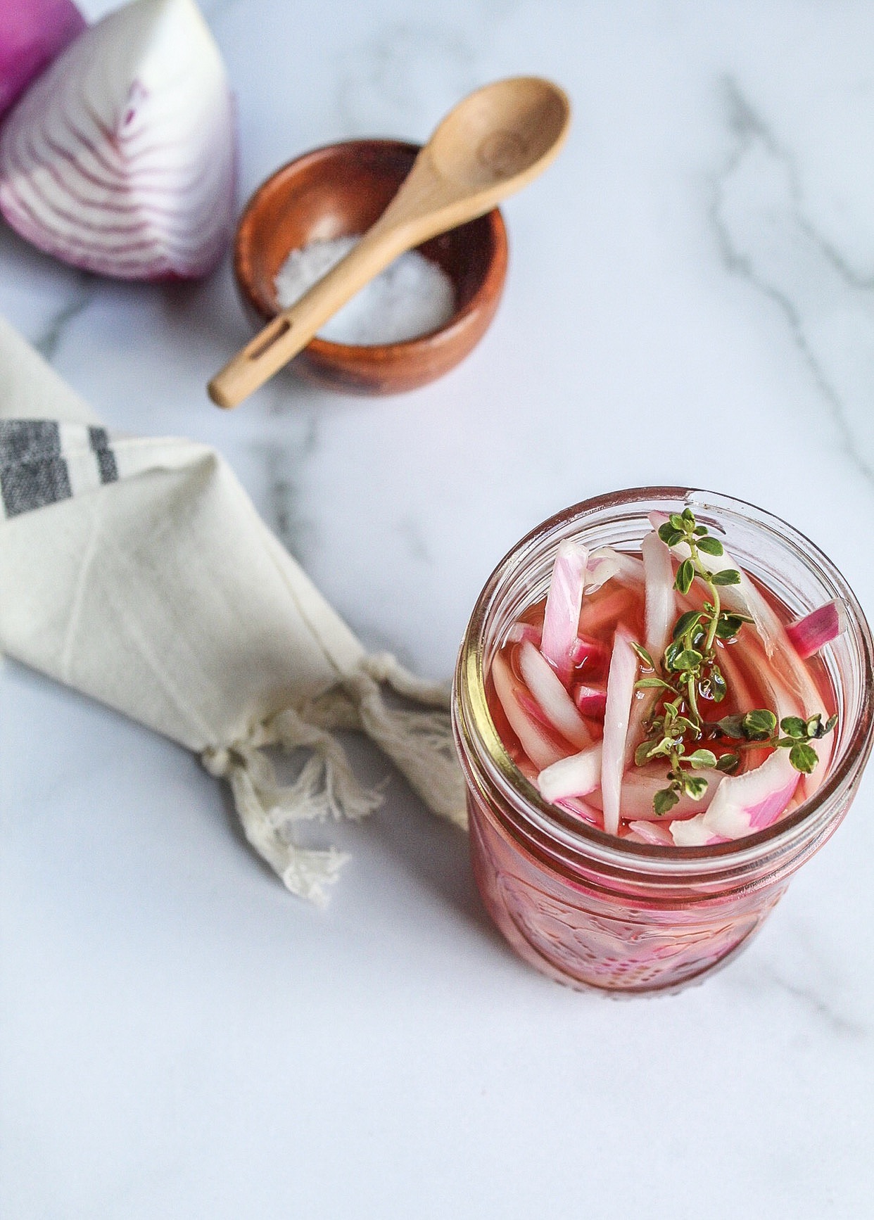 Pink pickled onions with fresh thyme