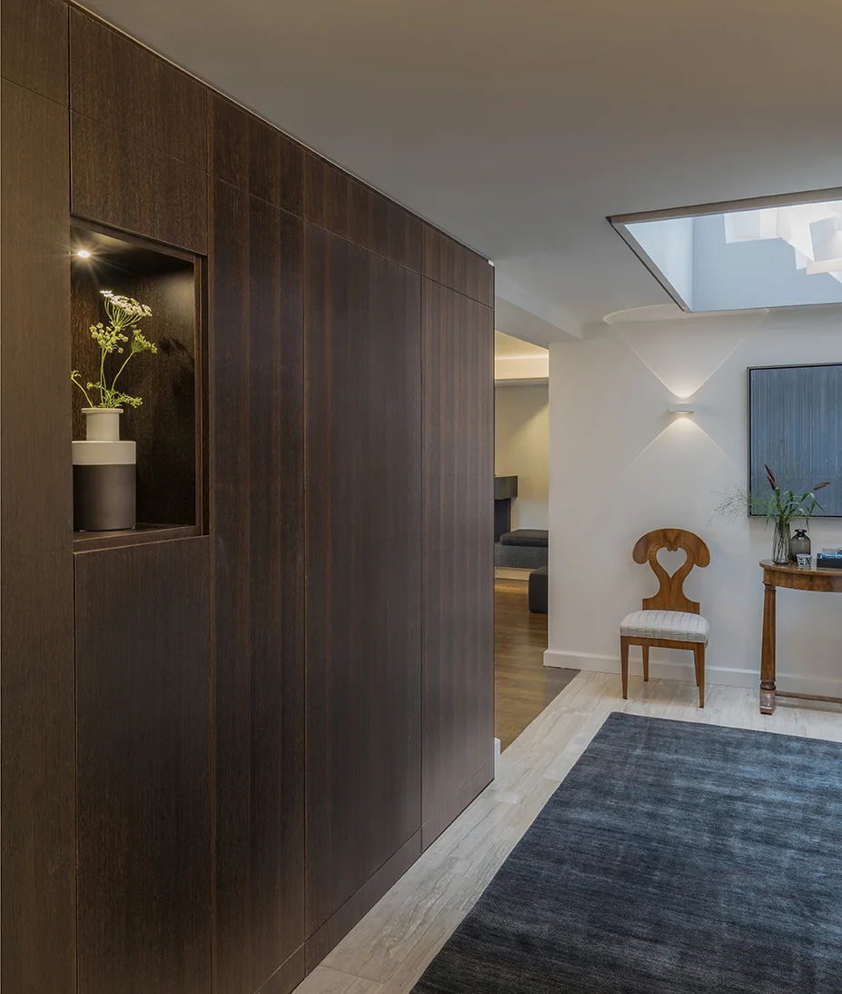 Entryway wall paneling in a contemporary Boston penthouse