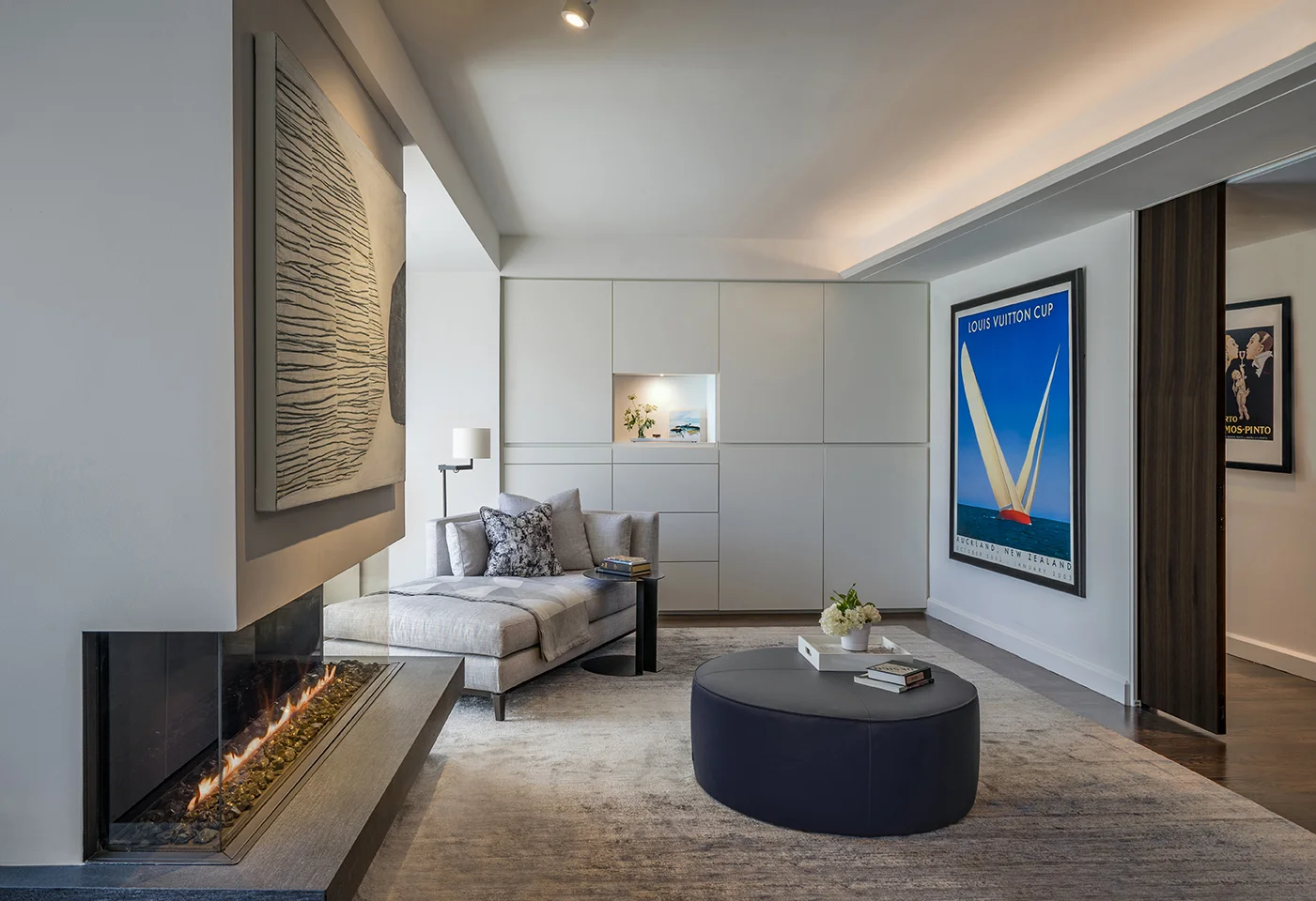 Primary bedroom seating area in a renovated penthouse in Boston