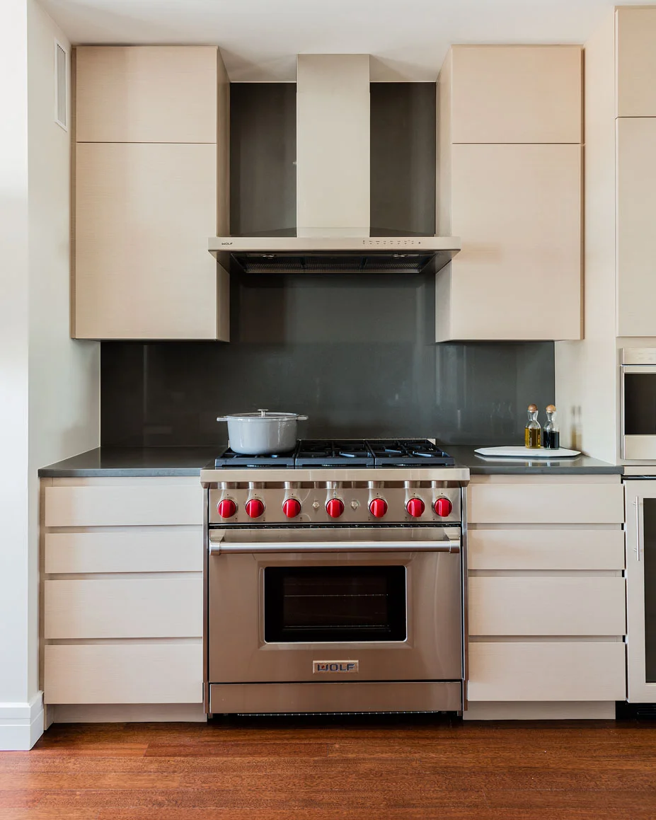 Gas stove in a renovated high-rise apartment kitchen