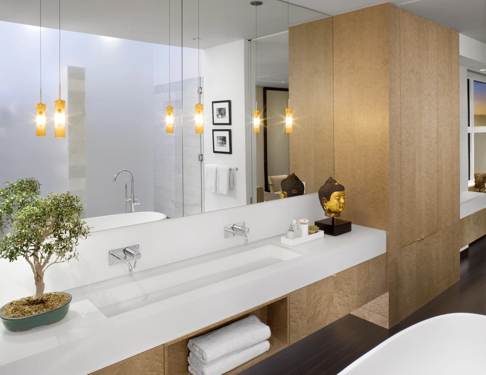 A modern loft featuring a luxury primary bathroom design.