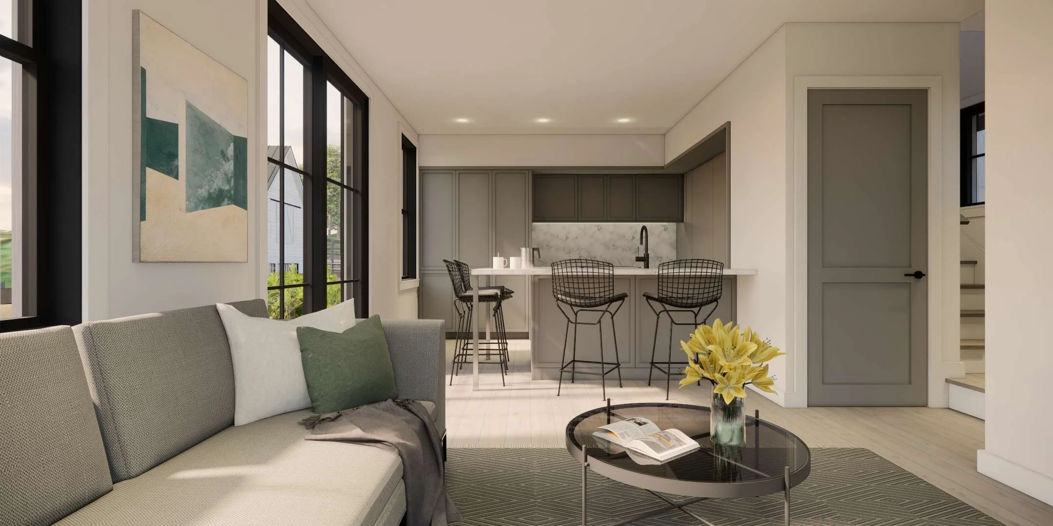 Modern interior featuring a pale gray kitchen with modern cabinetry