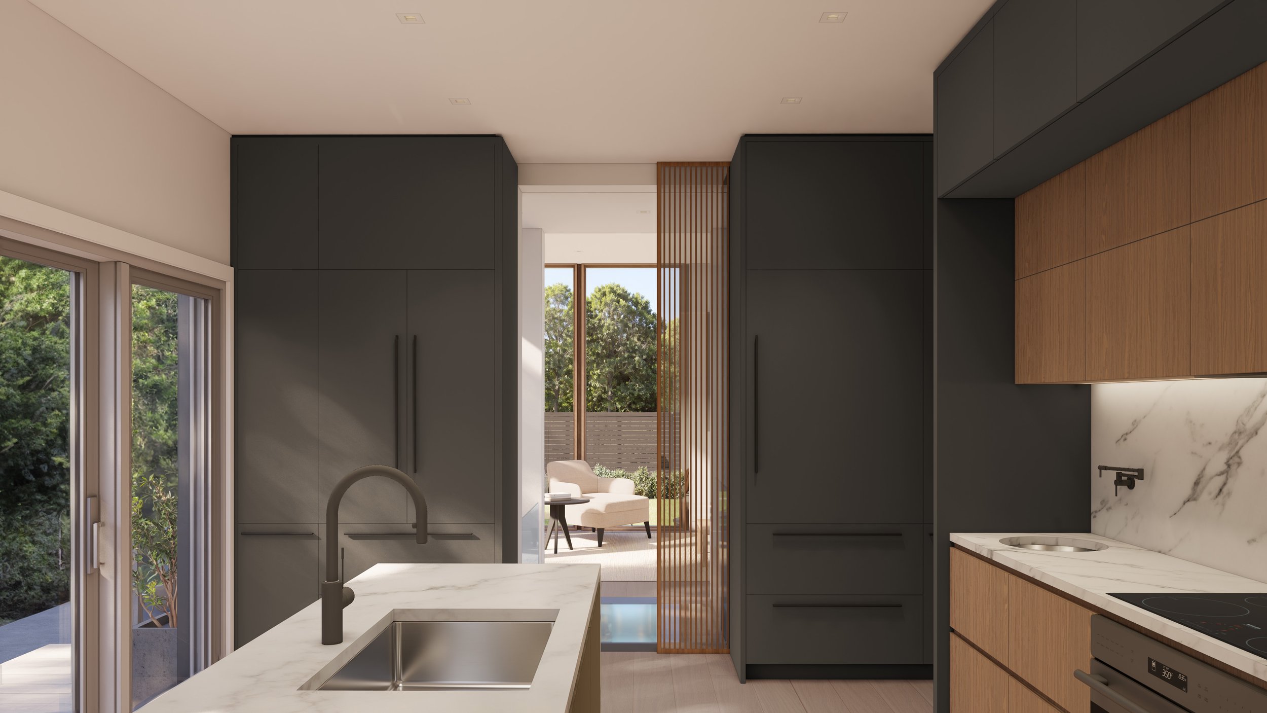 Modern two tone kitchen with a marble island and glass door to screen off an adjacent living room