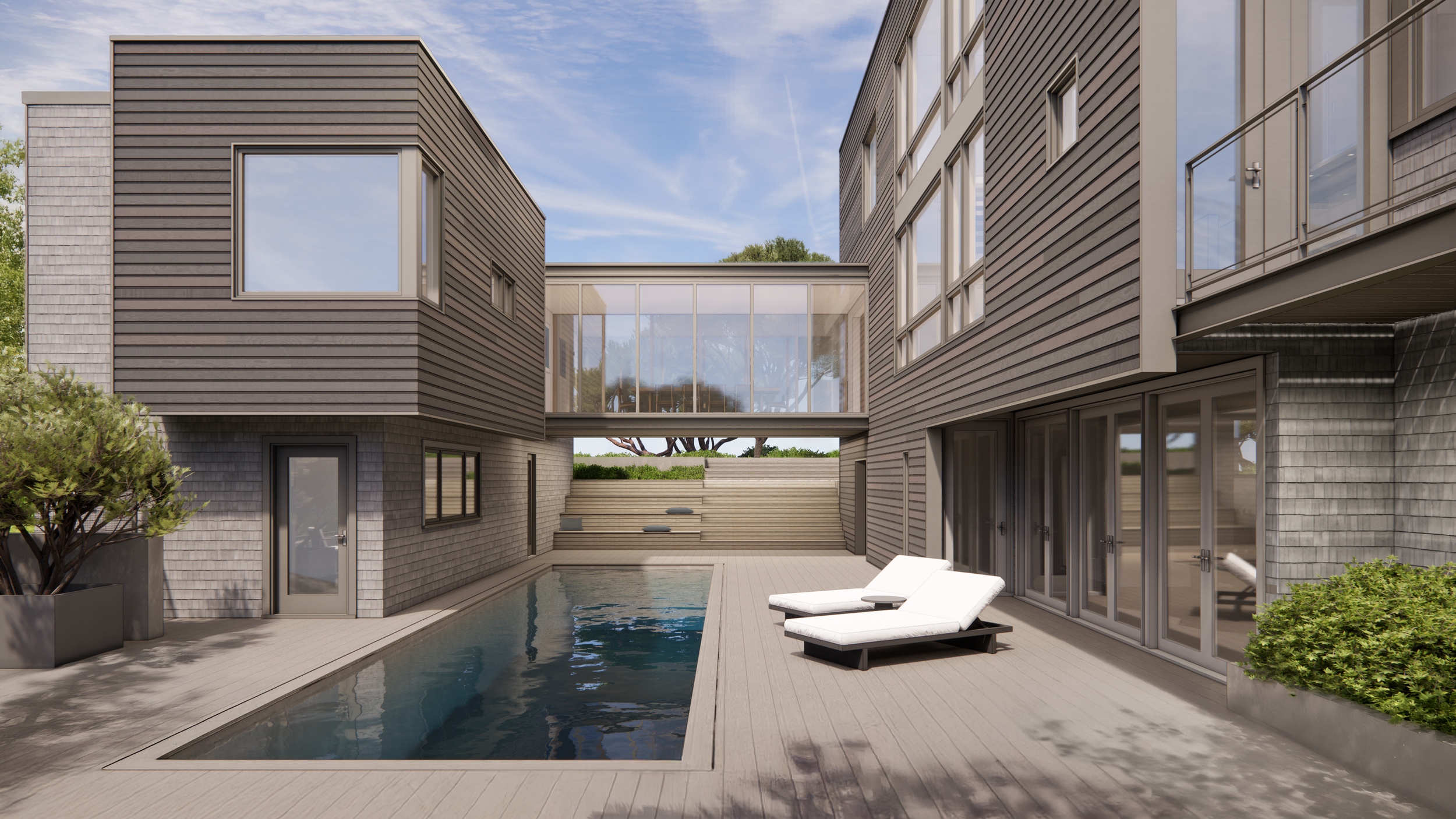 Modern beach house with sunken central pool deck.