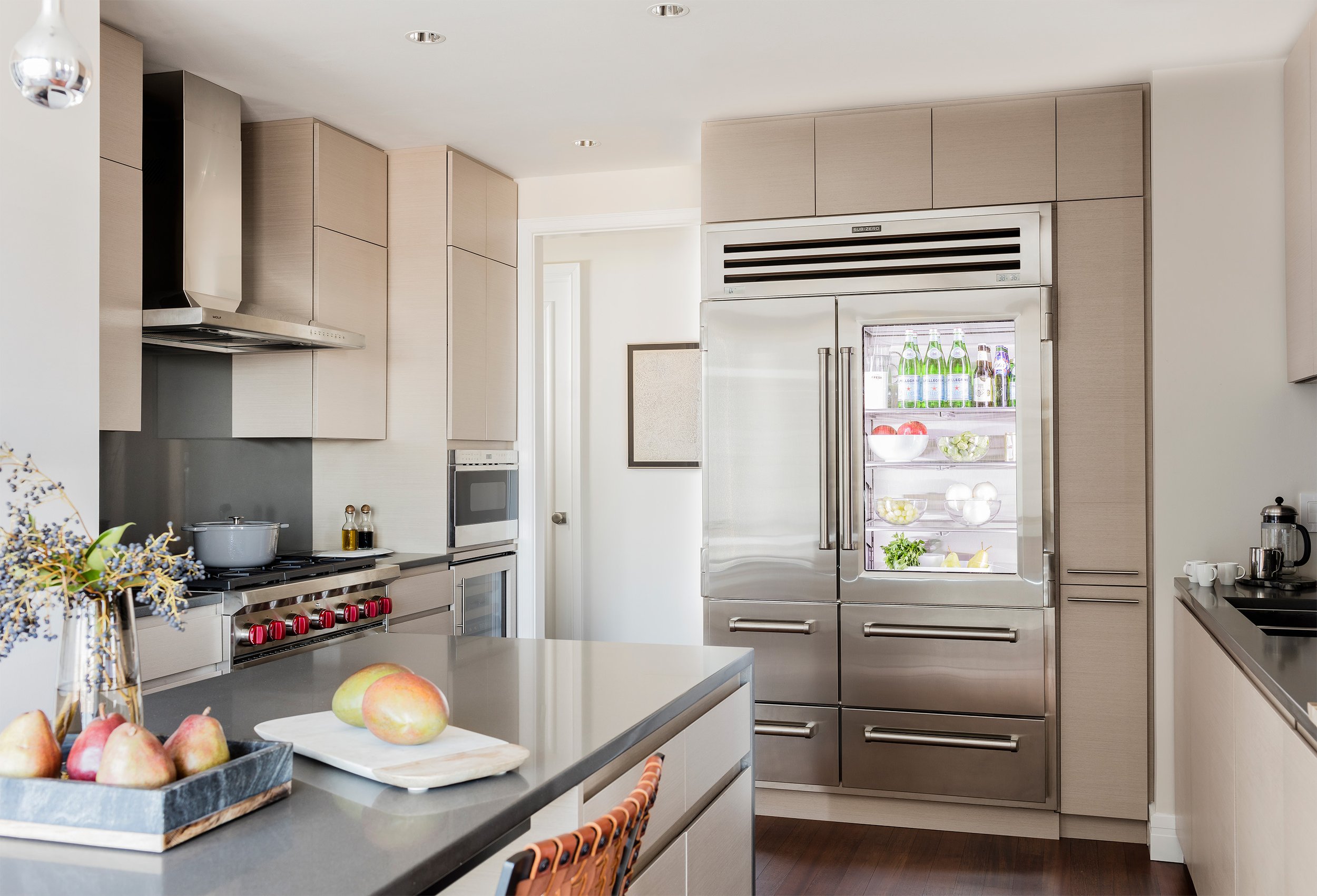 A modern kitchen renovation featuring high-performance stainless-steel appliances