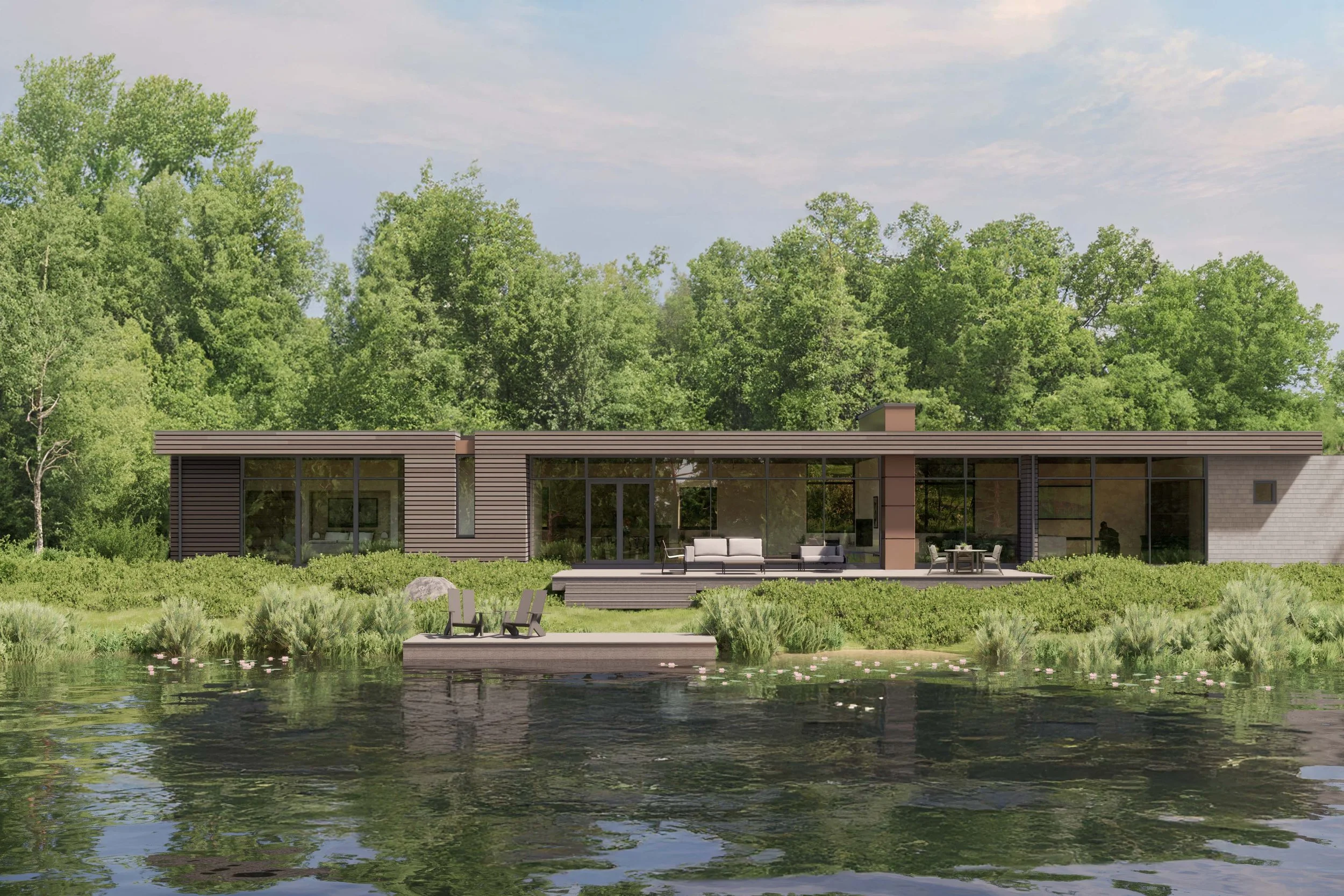 A modern house on a lakefront featuring large glass walls and an overhanging flat roof