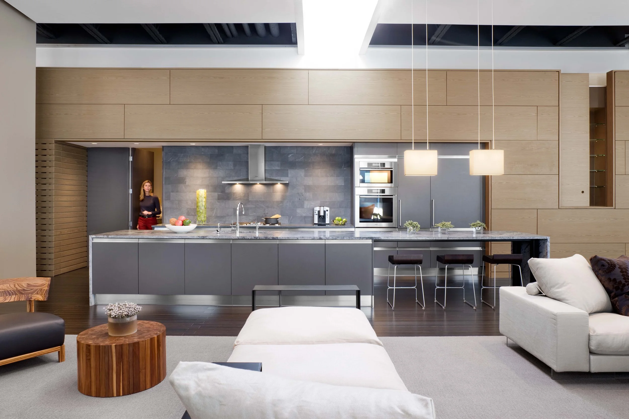 A modern loft interior renovation with a large kitchen