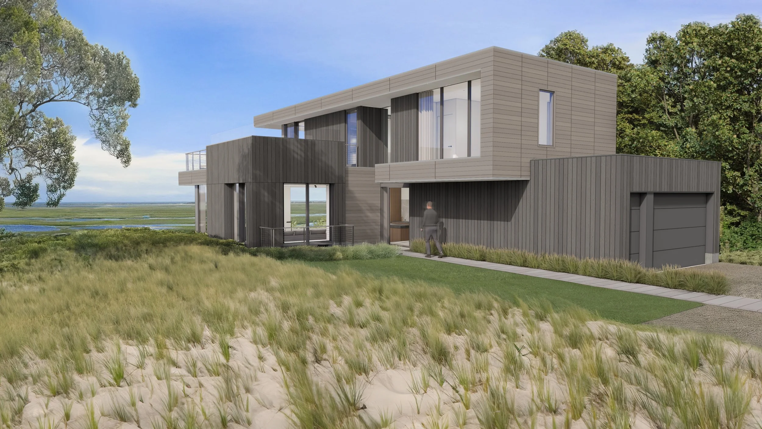 Flat roofed modern coastal house on a dune overlooking the Cape Cod shore