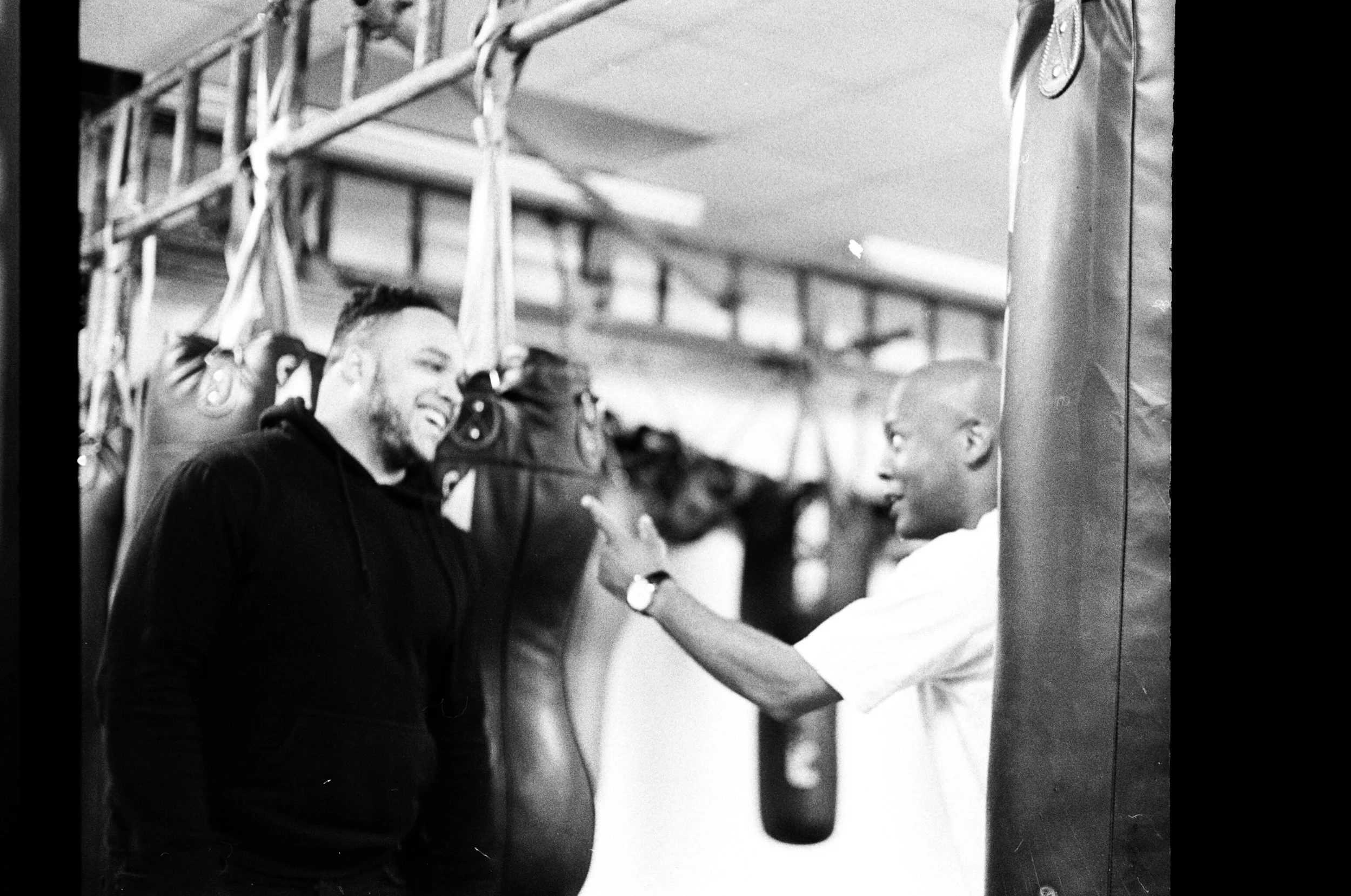 Coach Eyez (right) and Rickardo McKenzie (left) in conversation.