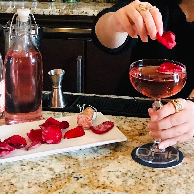OHK&rsquo;s Centennial Cocktail for February: Romantic twist on a French 75, handmade rose petal simple syrup shaken with gin and topped with ros&egrave; taittinger, garnished with a sugared red rose petal #taittingertime #taittinger #french75 #oheka