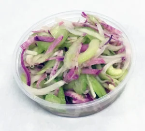 Purple radish, celery and scallions marinated in a fresh squeezed mandarin juice dressing.