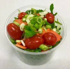 Arugula with carrot, grape tomatoes and scallions