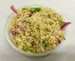 Quinoa with red radish, celery, scallion and an apple cider vinegar dressing.