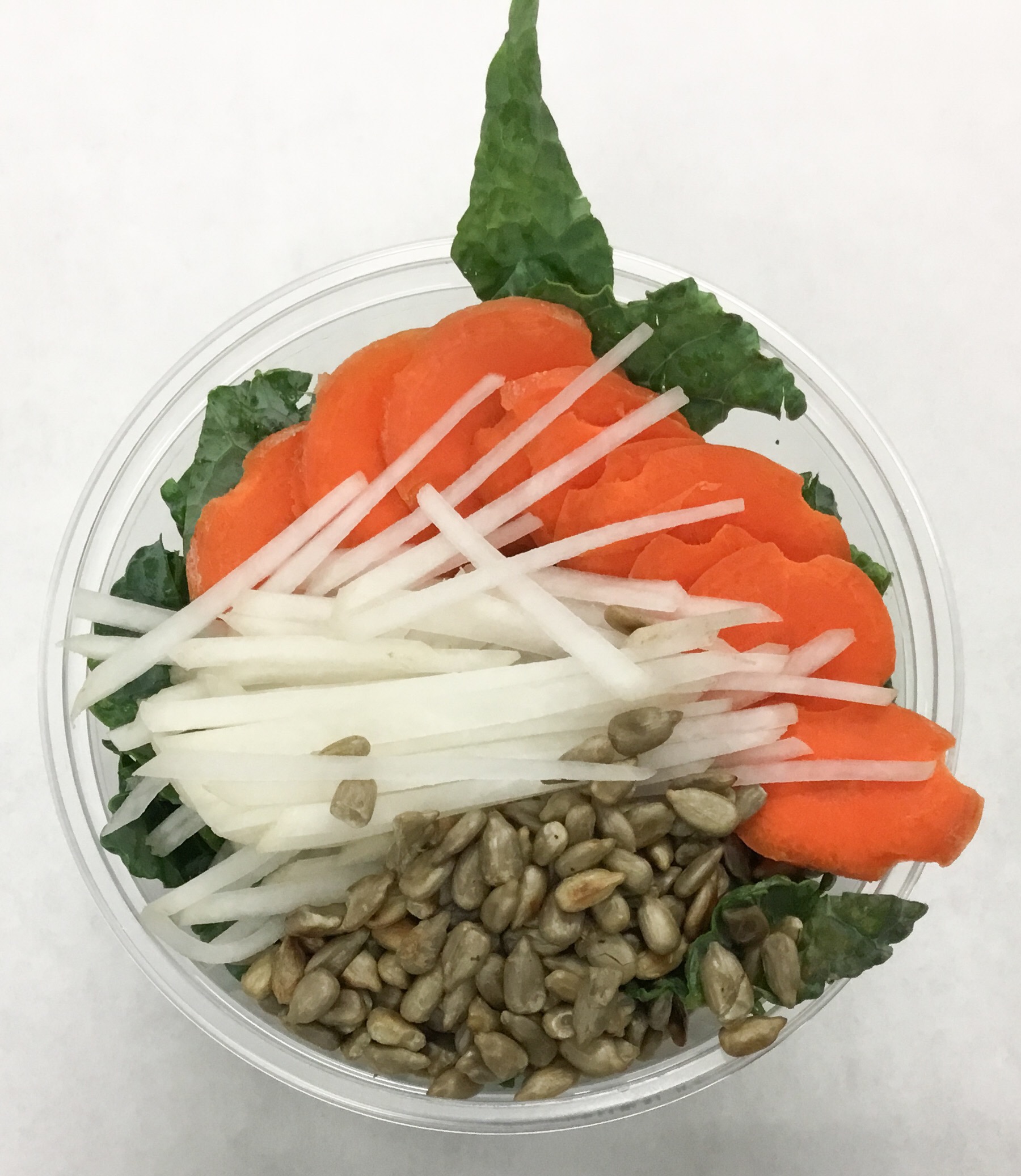 Lacinato kale, carrot, daikon radish and dry roasted sunflower seeds.