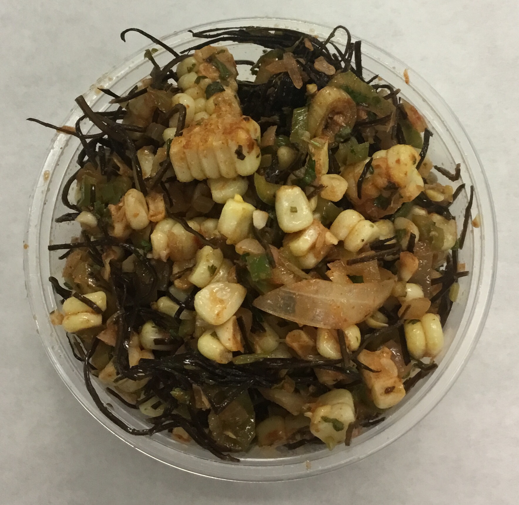 Corn salad with arame (seaweed), onion, Anaheim peppers, parsley , cilantro, scallions, lemon, cayenne, paprika and brown rice vinegar.