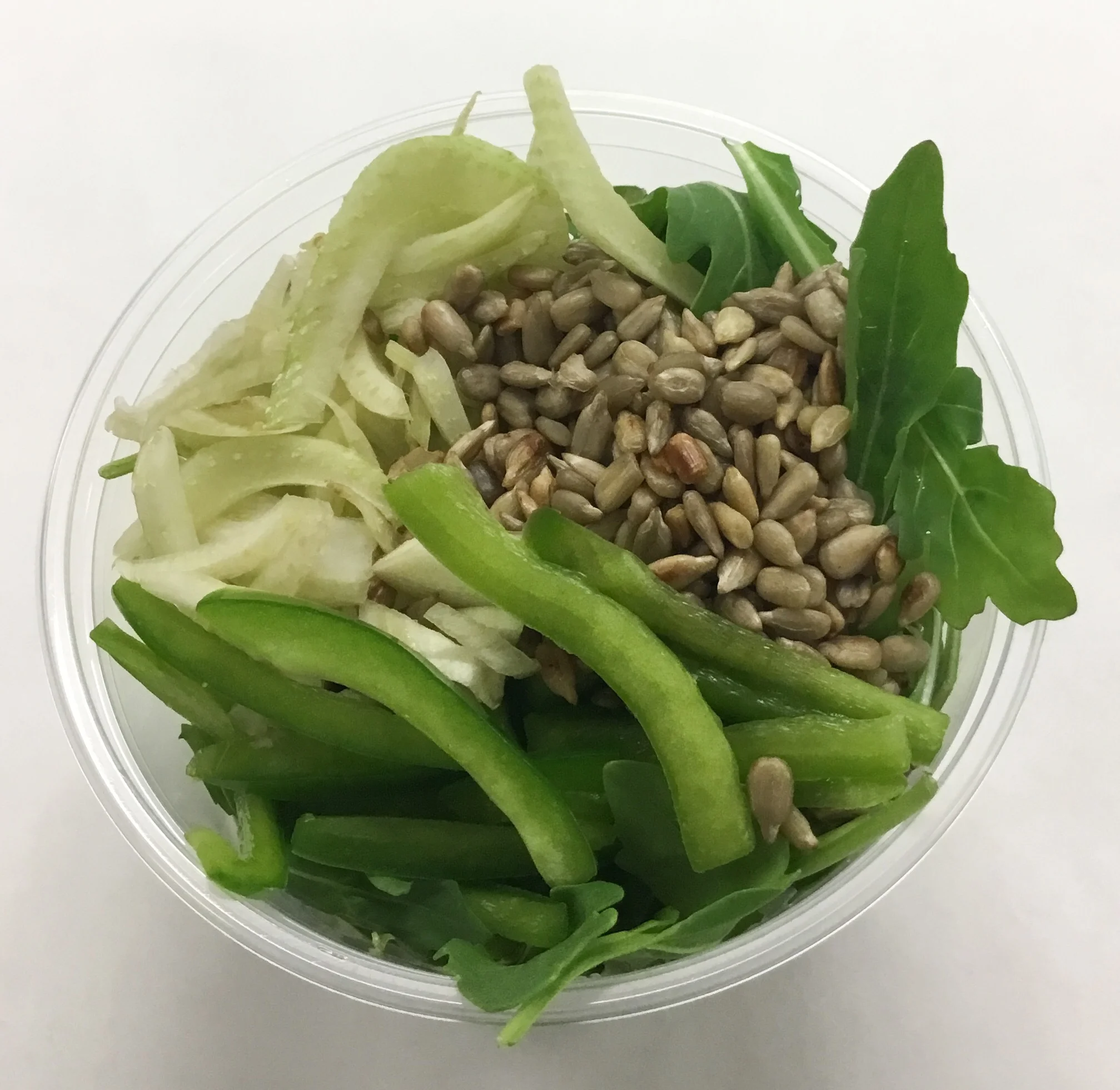 Arugula with fennel, green peppers and fresh roasted sunflower seeds.