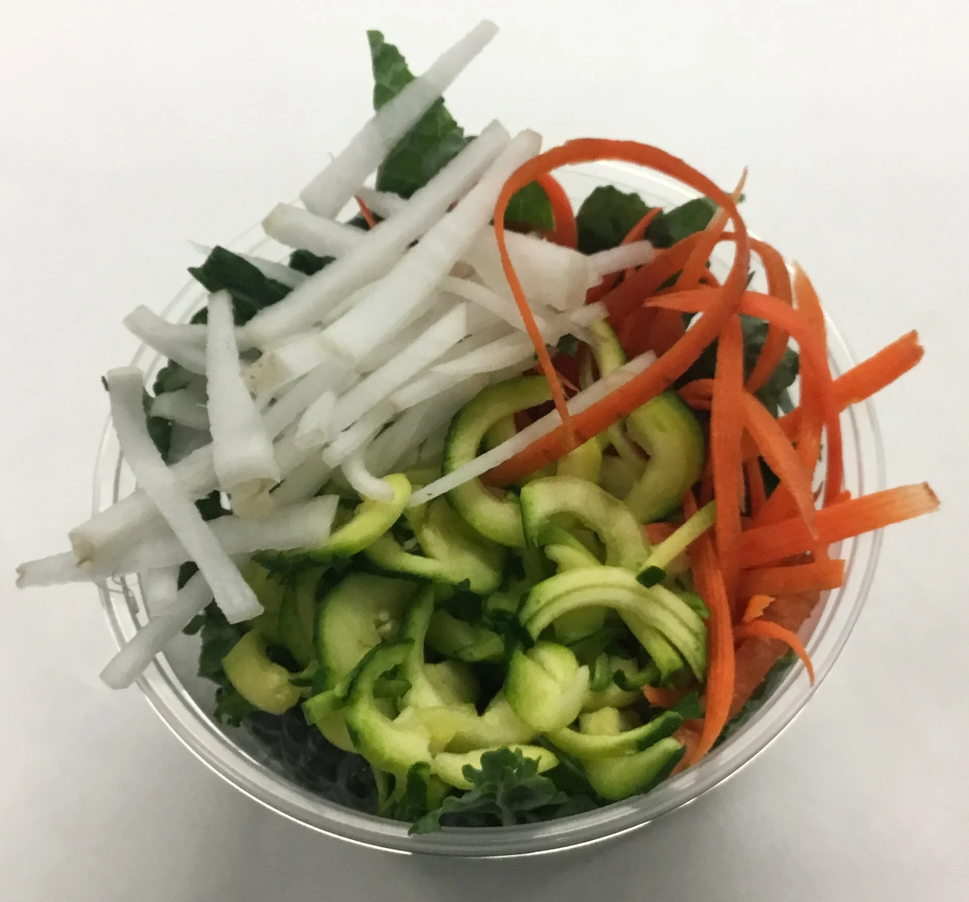 Lacinato kale with carrot, daikon (radish) and zucchini.