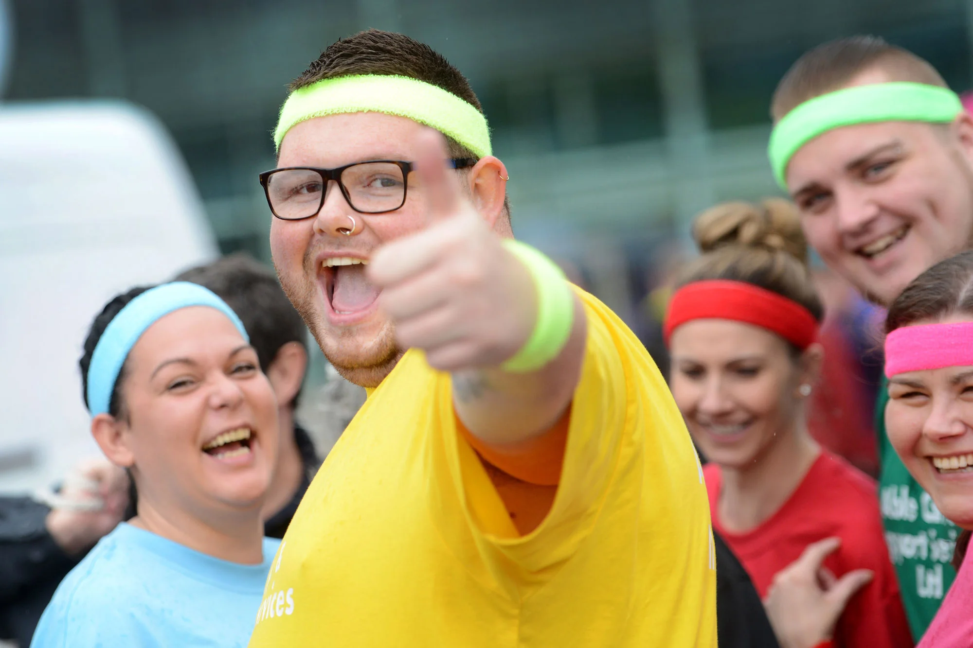 Organ transplant recipients take on an inflatable assault course.