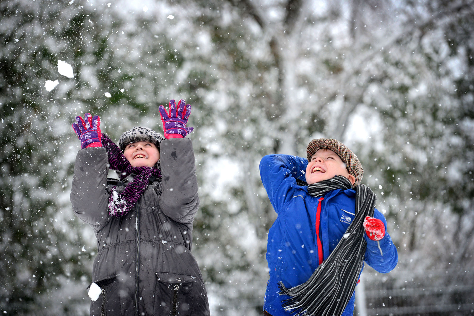 Fun in the snow - Lucy Lovell, and Jonathan Diveney, both ten from St Josephs Primary, Shaw, Oldham.