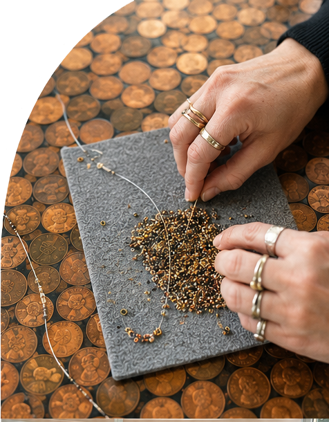Necklace making hands.png