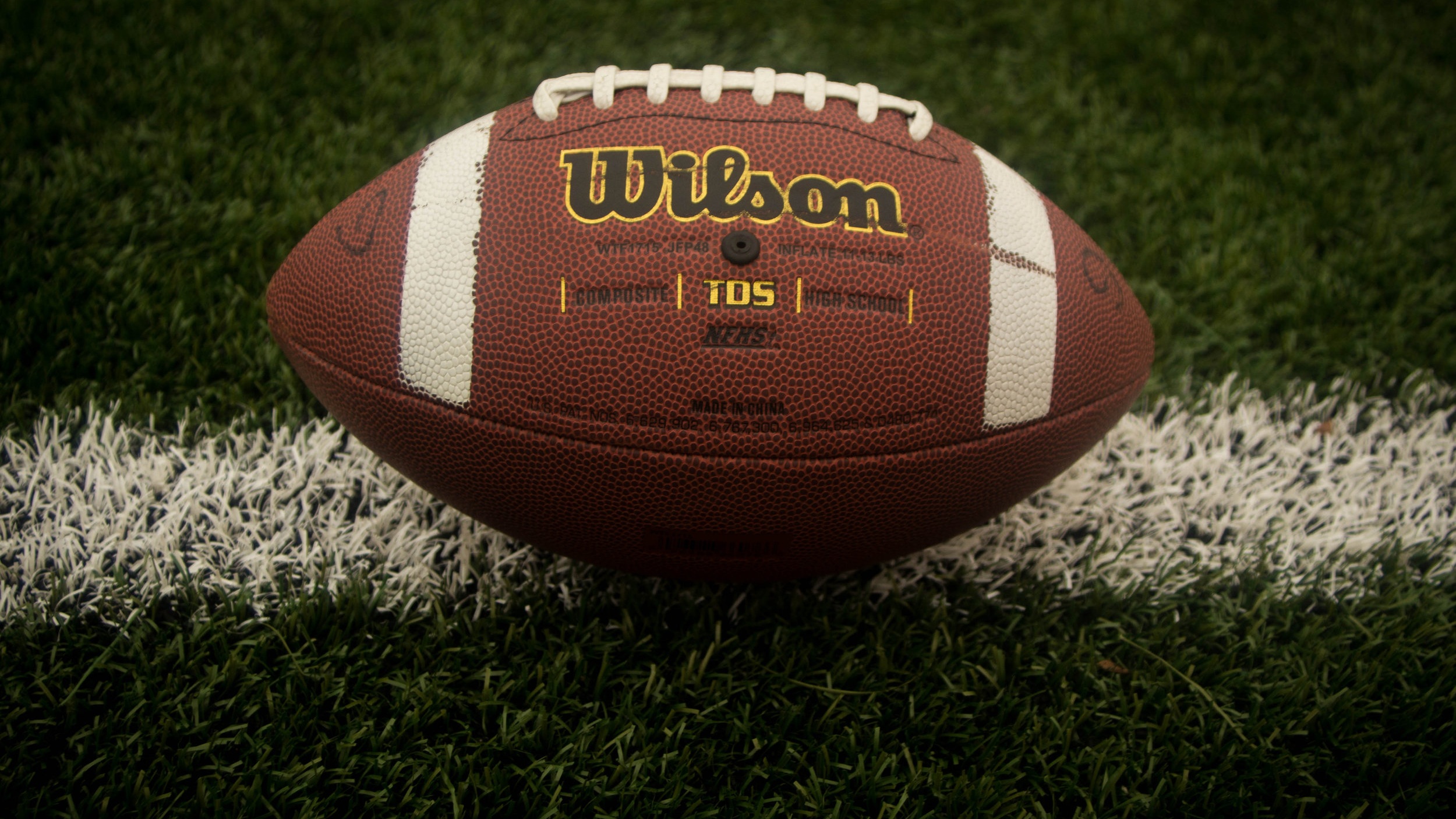 Canva+-+American+football+on+football+field.jpg