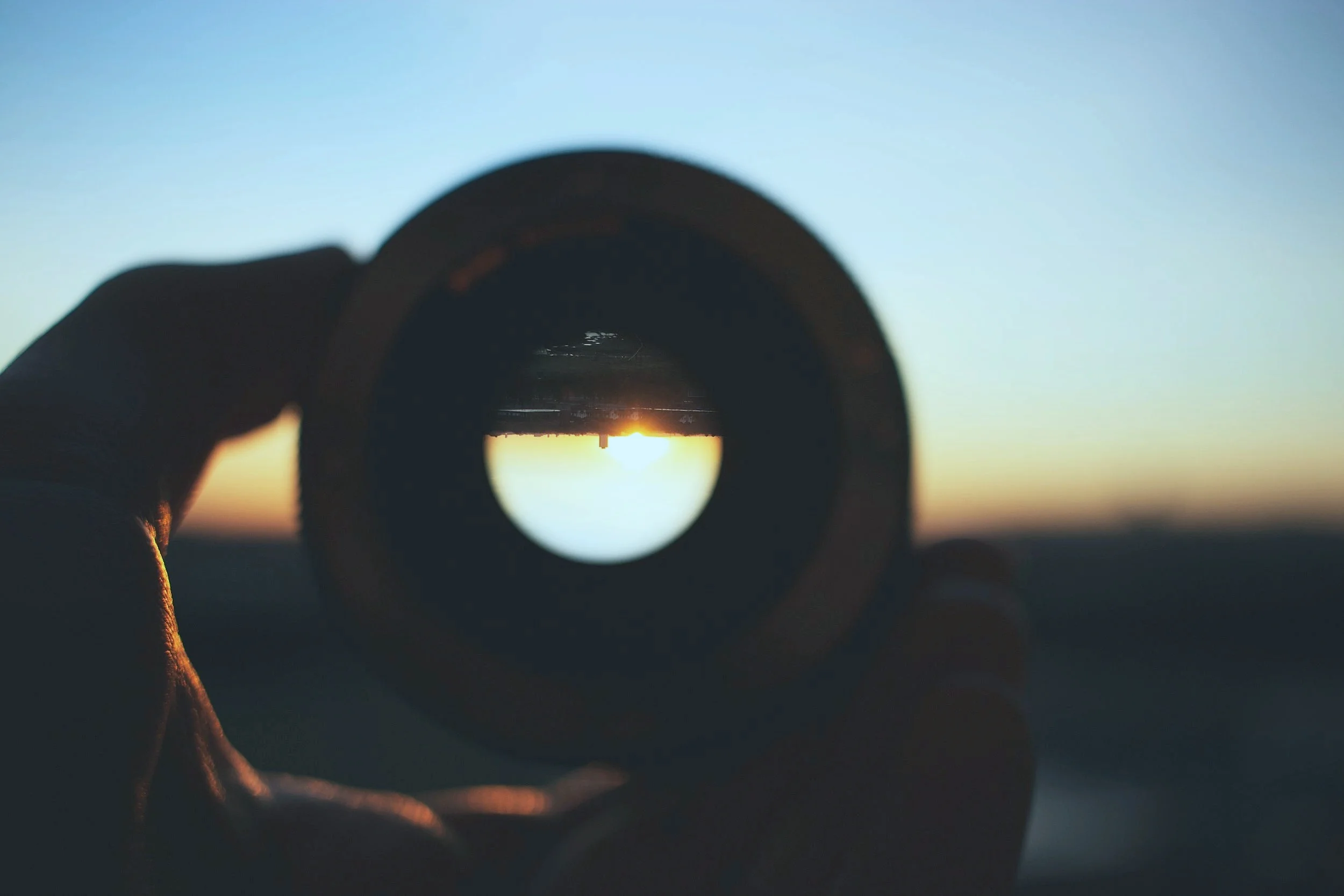 bringing city to focus through lens