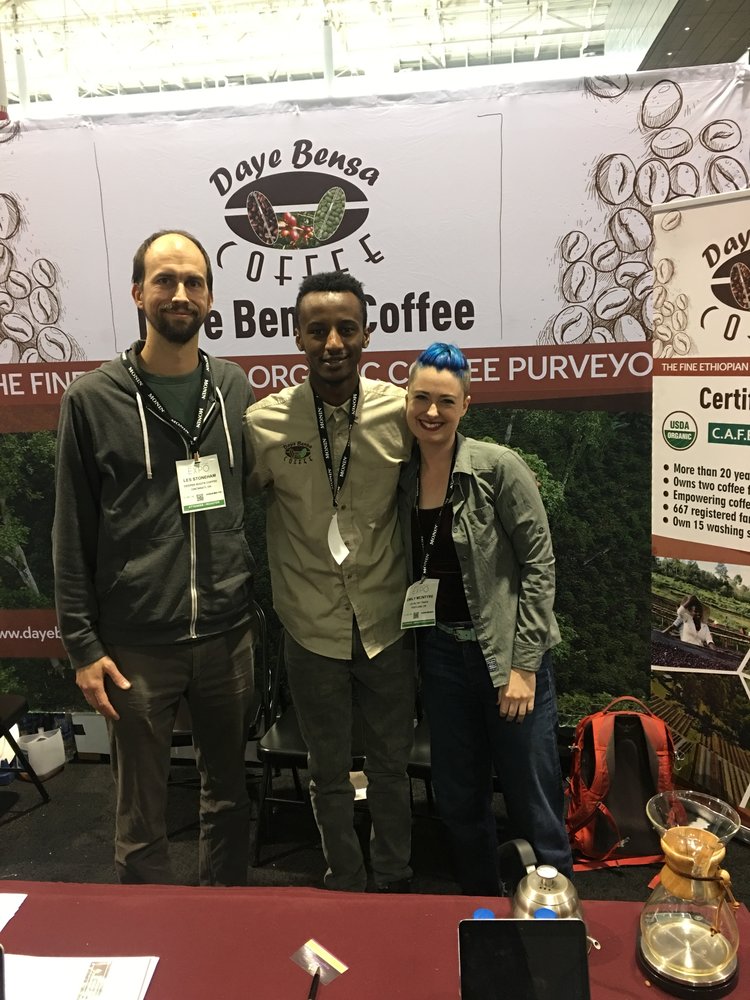Customer Les Stoneham of Deeper Roots with Kenean Asefa, whose family produces some of the coffees DR roasts!