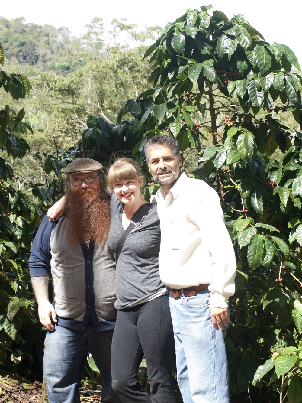 Us with Juan Luis, Peruvian coffee farmer who we worked with until he passed away, on his beautiful farm, Finca Santa Josefa.